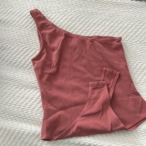 Rose colored one shoulder body suit
